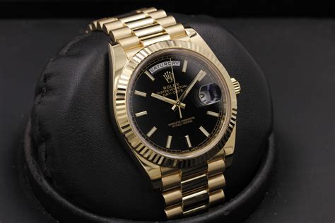 rolex day date gold 40mm.